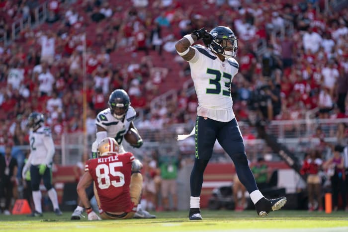 Seattle Seahawks strong safety Jamal Adams (33) celebrates after hitting San Francisco 49ers tight end George Kittle (85) for an incomplete pass during the third quarter at Levi's Stadium.